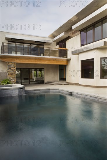 Rear Exterior of Modern Home and Swimming Pool