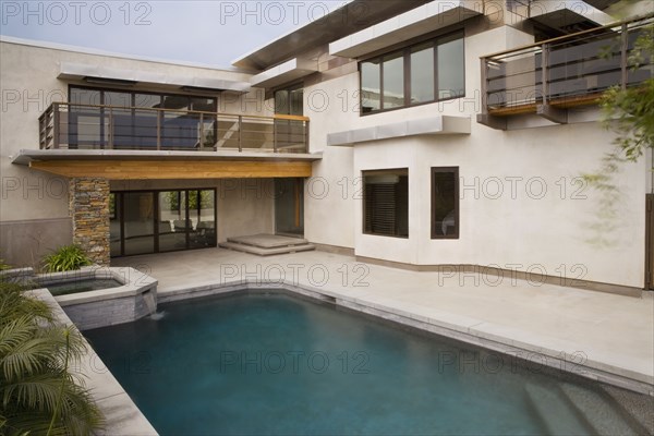 Rear Exterior of Modern Home and Swimming Pool