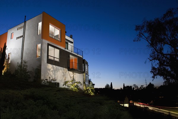 Front Exterior of Modern Condominium at Dusk