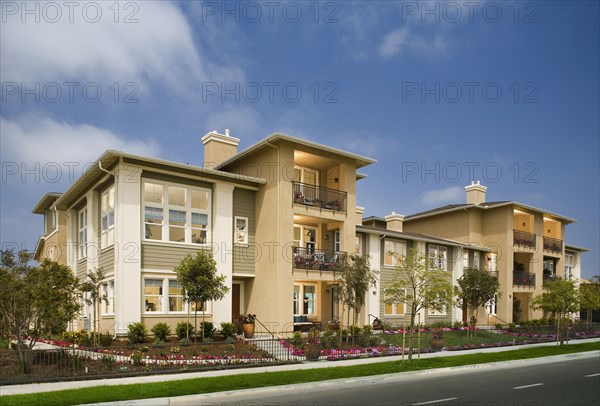 Exterior of attached homes on a sunny day