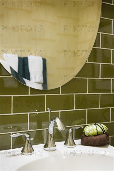 Detail of bathroom sink with mirror