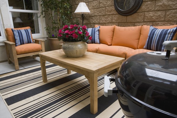 Outdoor patio with teak furniture