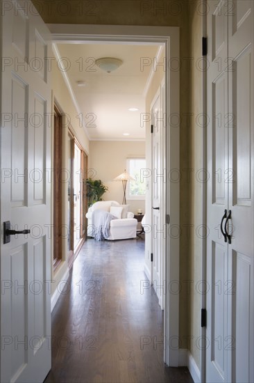 Interior of hallway leading into bedroom