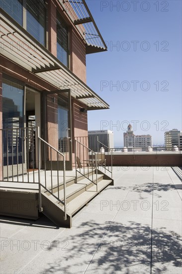 Modern overhang with view of cityscape.