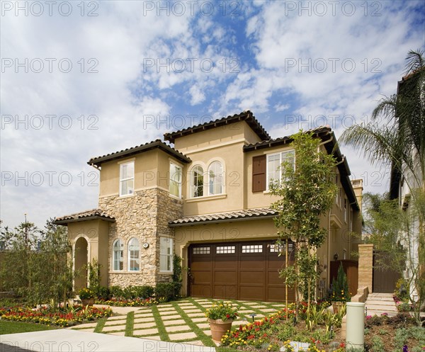 Exterior of a Tuscan Style home in the afternoon