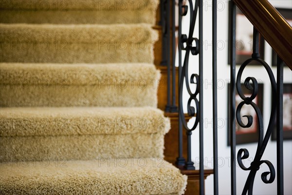 Detail of curved staircase and railing.