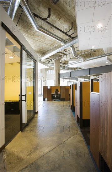 Interior of a modern office space with cubicles