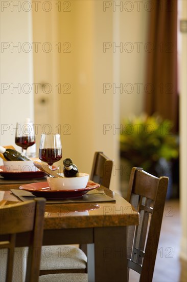 Place setting with bowl plate and wine glass