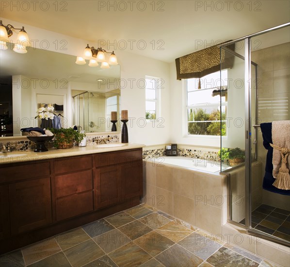 Bathtub in corner of master bath