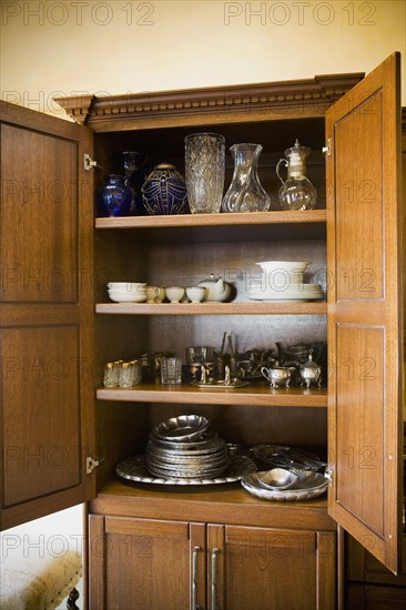 Pantry filled with vintage dishware