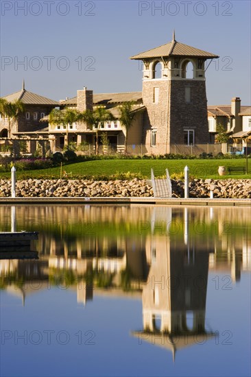 View of contemporary housing community from across channel