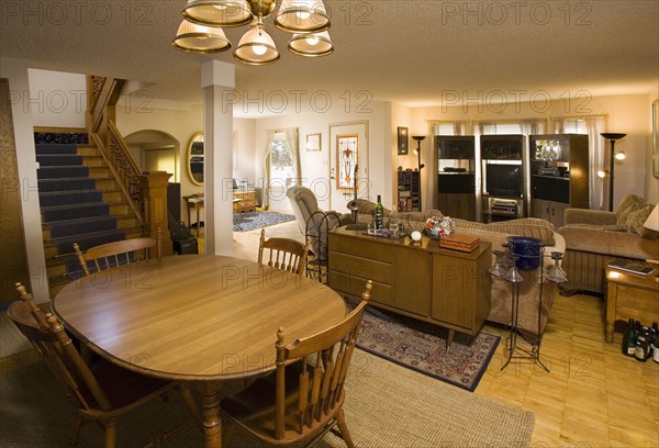 Interior of a large traditional living area with wood floors