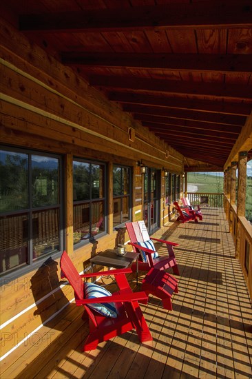 Chairs and table in balcony of house