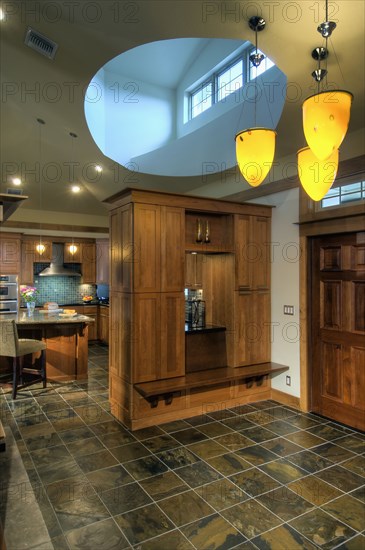 Cabinets and tiled floor in home entrance