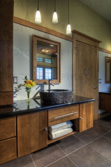 Custom designed master bath vanity with granite sink