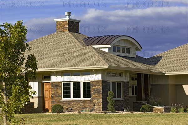 Unique dormer design with custom home