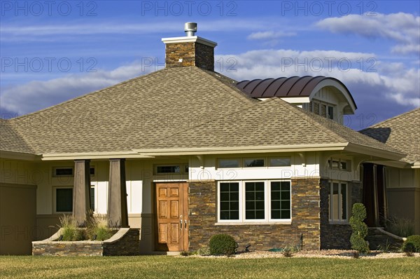 Unique dormer design with custom home