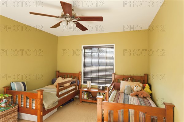 Twin beds in kids bedroom