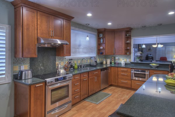 Kitchen counter and breakfast bar in contemporary house