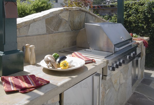 Outdoor grill and stone counter