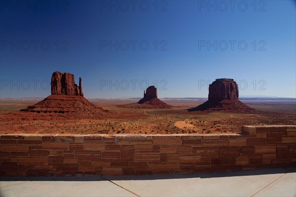 Butte rock formations in desert landscape