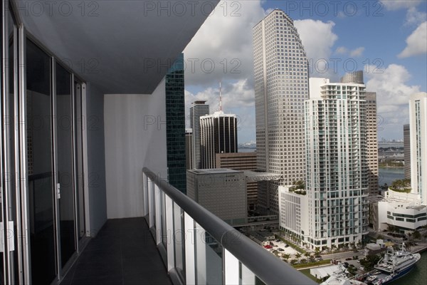 Balcony overlooking high rises in urban cityscape