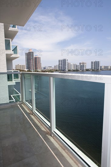 Balcony overlooking high rises in urban cityscape