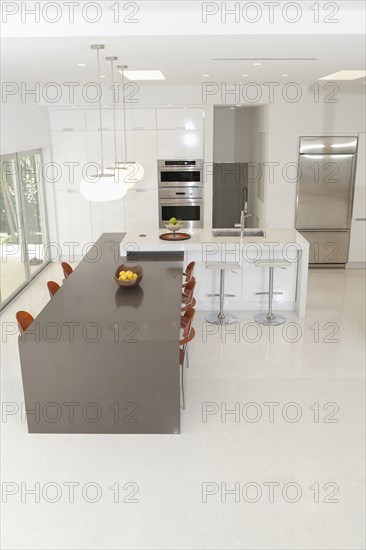 High angle view of counters in modern kitchen and dining area