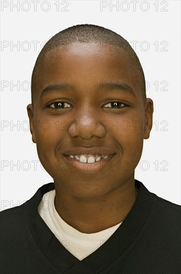 Close up of African American boy smiling