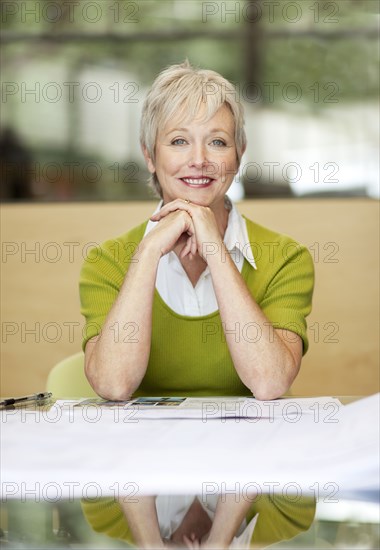 Portrait of smiling Caucasian businesswoman