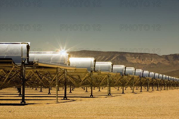 Rows of solar panels in desert