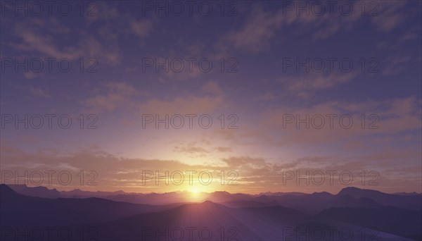 Sun setting over rural mountains