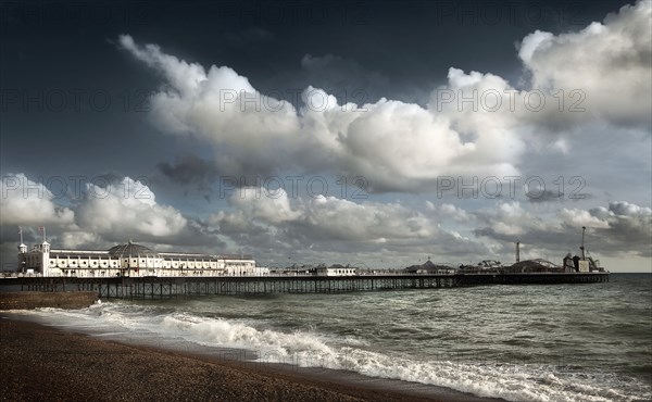 Clouds over boardwalk and beach