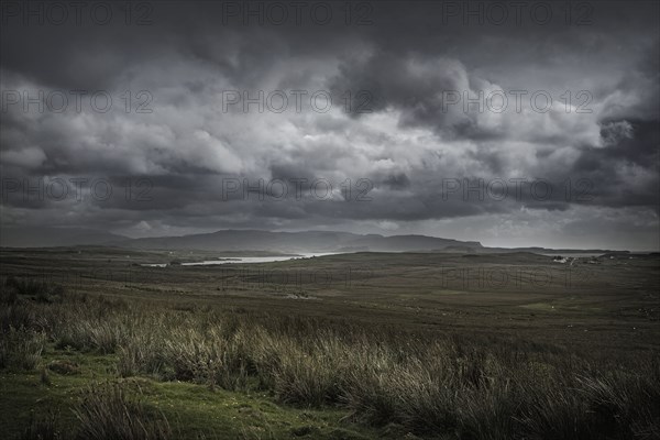 Storm clouds over rural landscape