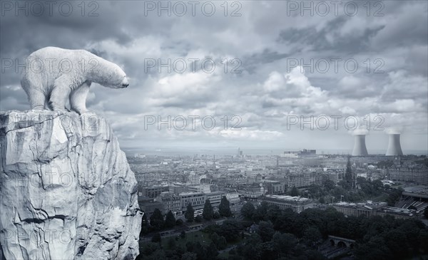 Polar bear overlooking cityscape from glacier