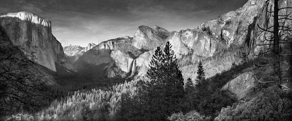 Rocky mountains overlooking rural valley