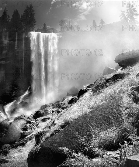 Waterfall and rocky hillside