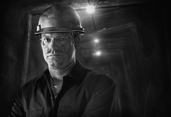 Caucasian carpenter wearing hard hat