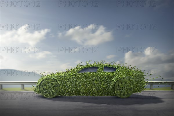 Car covered in growing plants