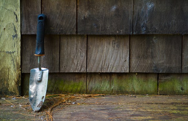 Close up of trowel outside house