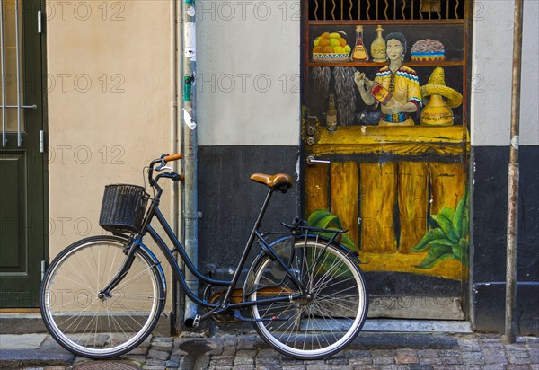 Bicycle parked on city street