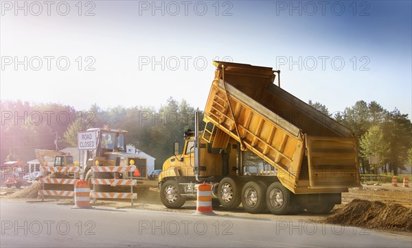 Dump truck dumping haul on site