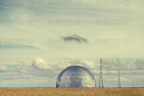 Observatory under cloudy sky