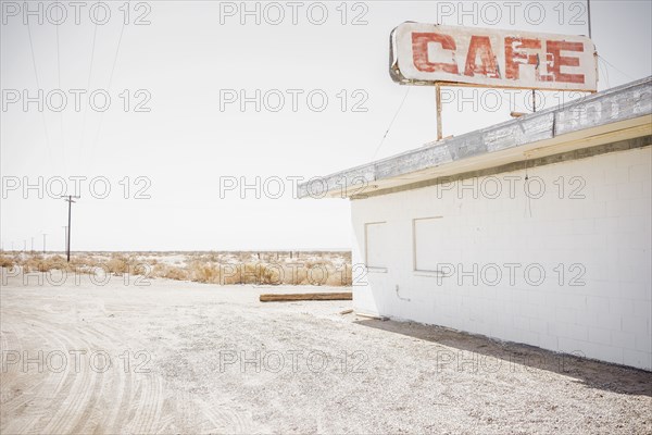 Abandoned cafe on rural dirt road