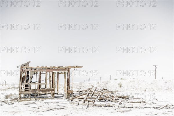 Abandoned structure in dirt lot