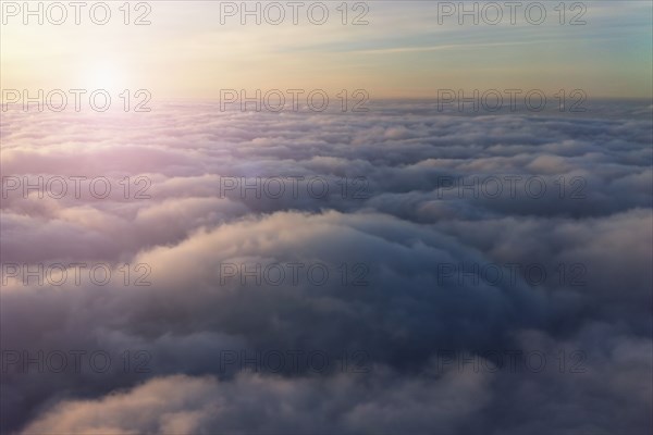 High angle view of sky above clouds