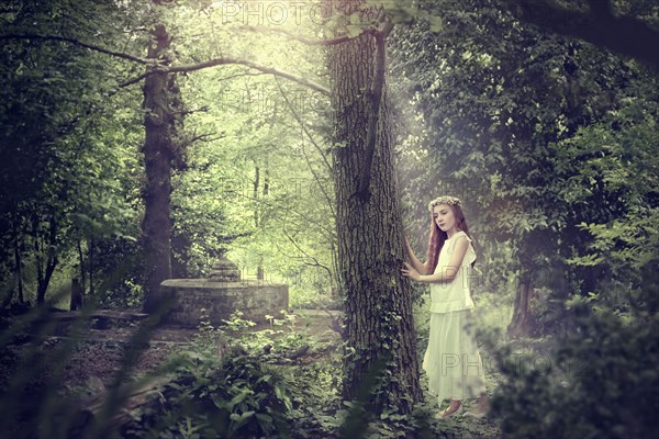 Caucasian girl exploring forest