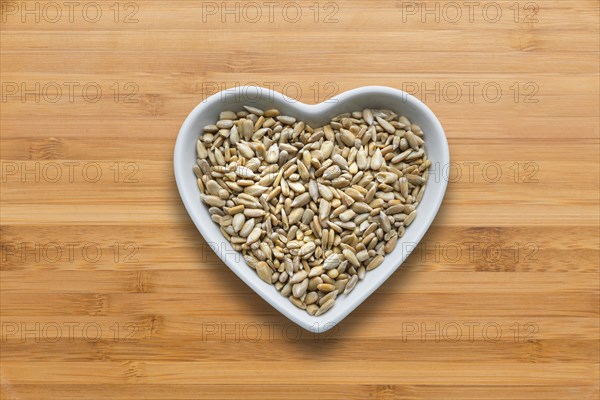 Heart-shaped bowls of heart-healthy seeds