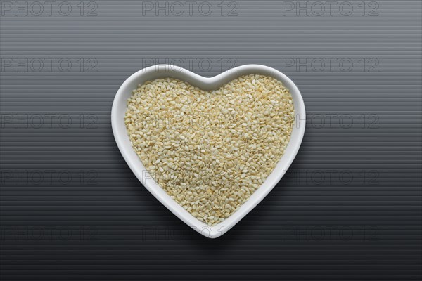 Heart-shaped bowls of heart-healthy seeds