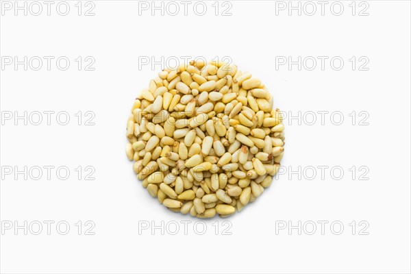 Pile of pine nuts in shape of a circle